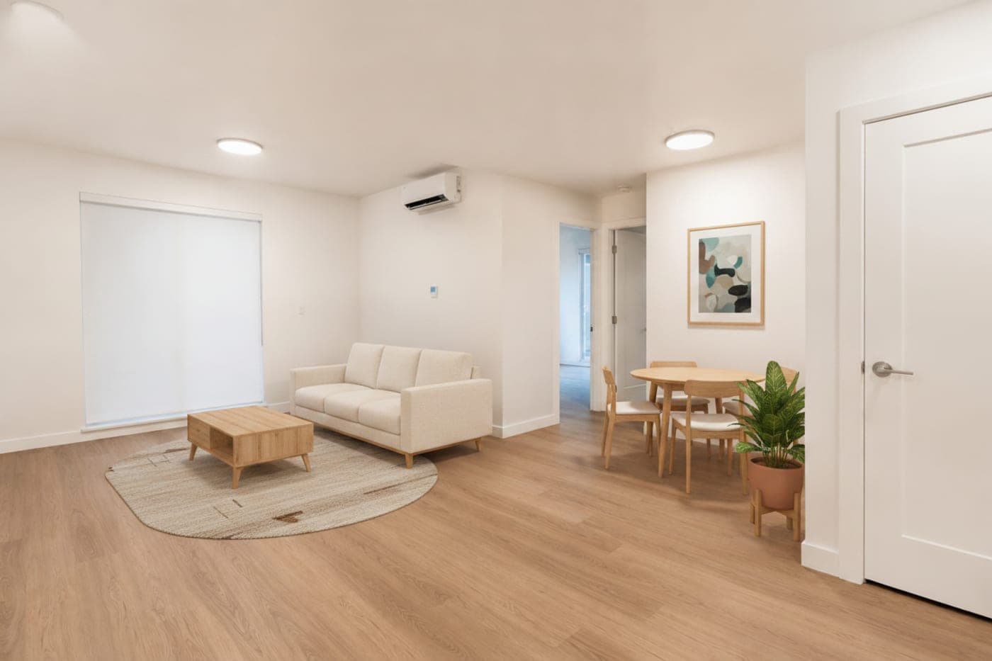 Open living and dining area in a Vancouver condo — virtually staged